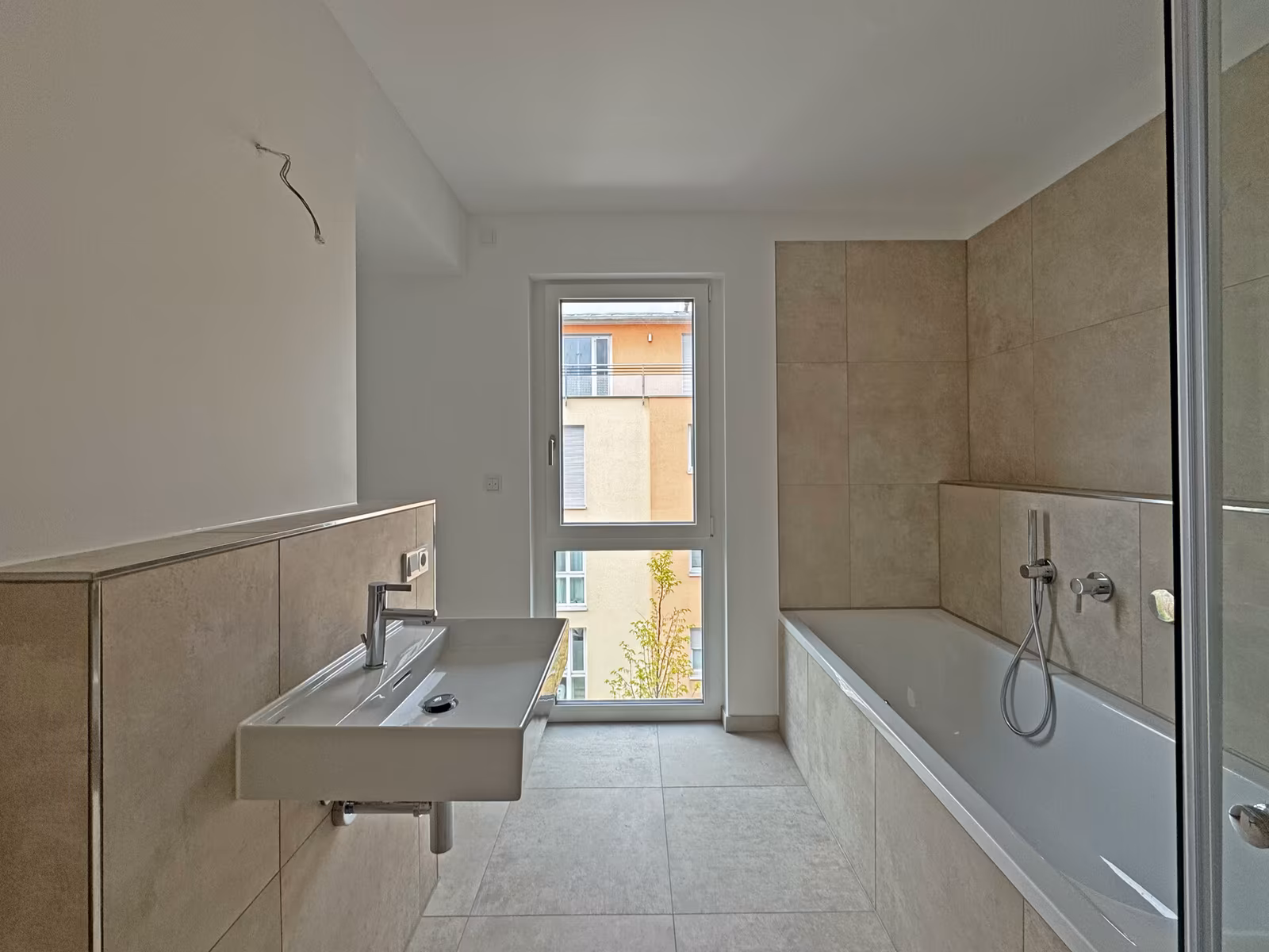 Lichtdurchflutete 3 Zimmer Wohnung in hochwertiger Neubau Wohnanlage