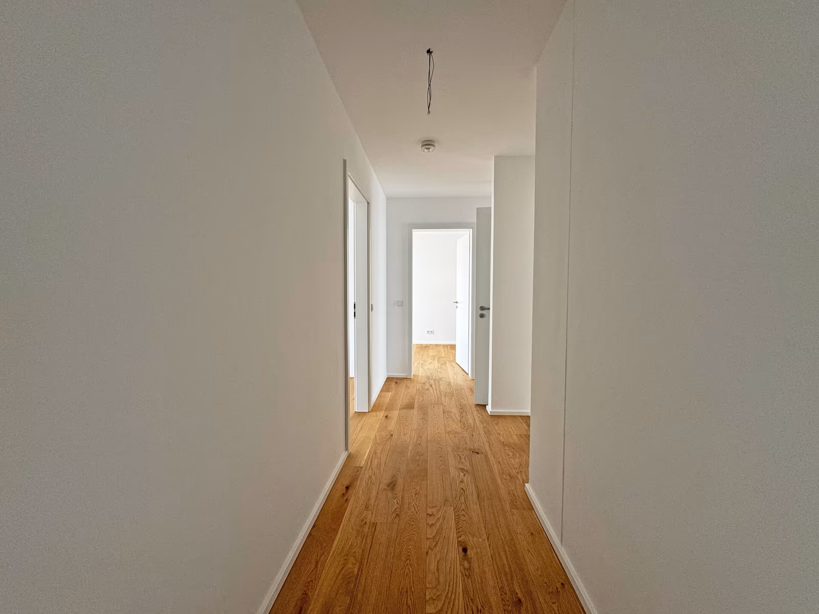 Lichtdurchflutete 3 Zimmer Wohnung in hochwertiger Neubau Wohnanlage